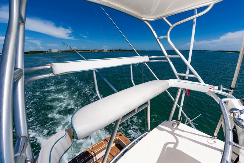 Slide: The Image of 2004 Albemarle 410 Express Fisherman on the water with blue sky and coastline. - 28