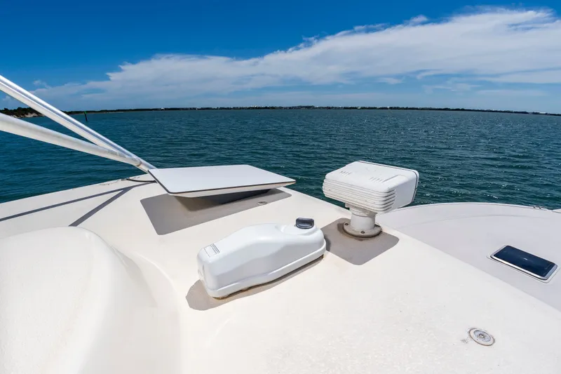 Slide: The Image of The deck of a 2004 Albemarle 410 Express Fisherman overlooking the water. - 30