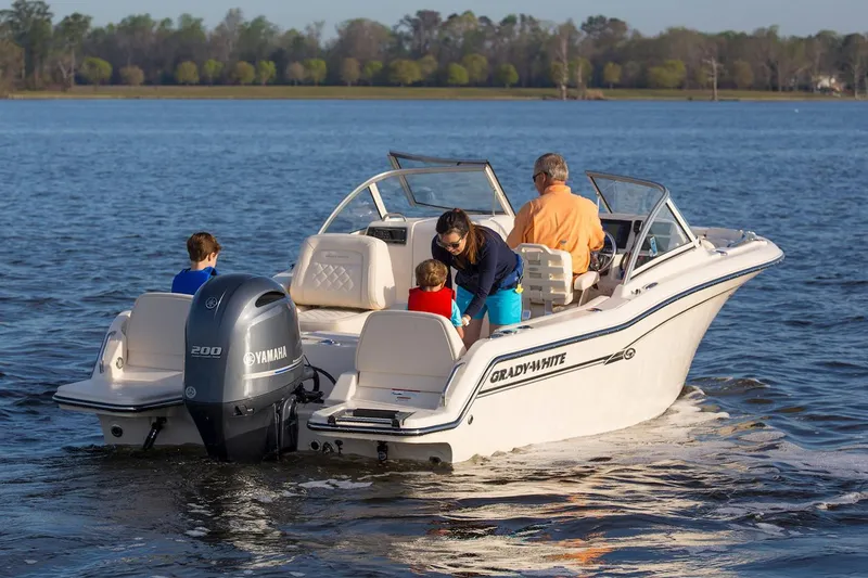 Slide: The Image of Manufacturer Provided Image: Family enjoying a ride on a 2022 Grady-White Freedom 215 boat. - 19