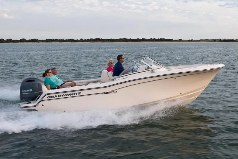 Slide: The Image of Manufacturer Provided Image: 2022 Grady-White Freedom 215 boat cruising on water with passengers. - 12