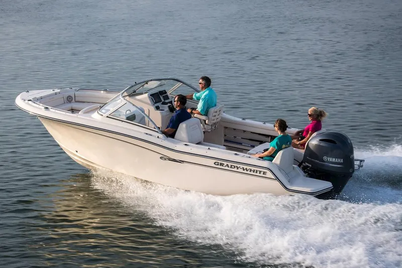 Slide: The Image of Manufacturer Provided Image: 2022 Grady-White Freedom 215 boat cruising on water with passengers. - 14