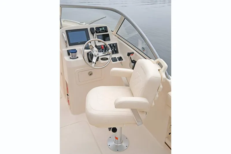 Slide: The Image of Manufacturer Provided Image: 2022 Grady-White Freedom 215 boat helm with captain's chair and navigation controls. - 24