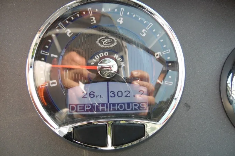 Slide: The Image of Tachometer of 2020 Cobalt 220S showing 26 feet depth and 302.2 hours. - 18