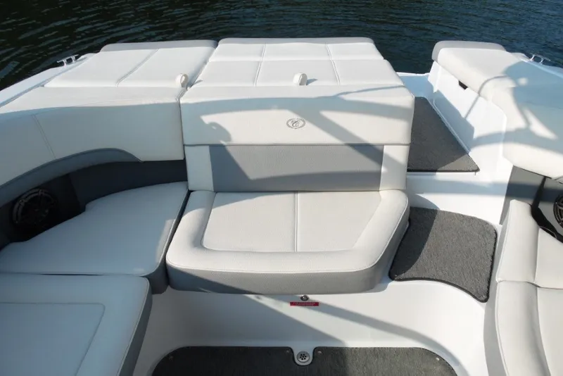 Slide: The Image of Luxury seating on a 2020 Cobalt 220S boat, featuring white and gray upholstery. - 25