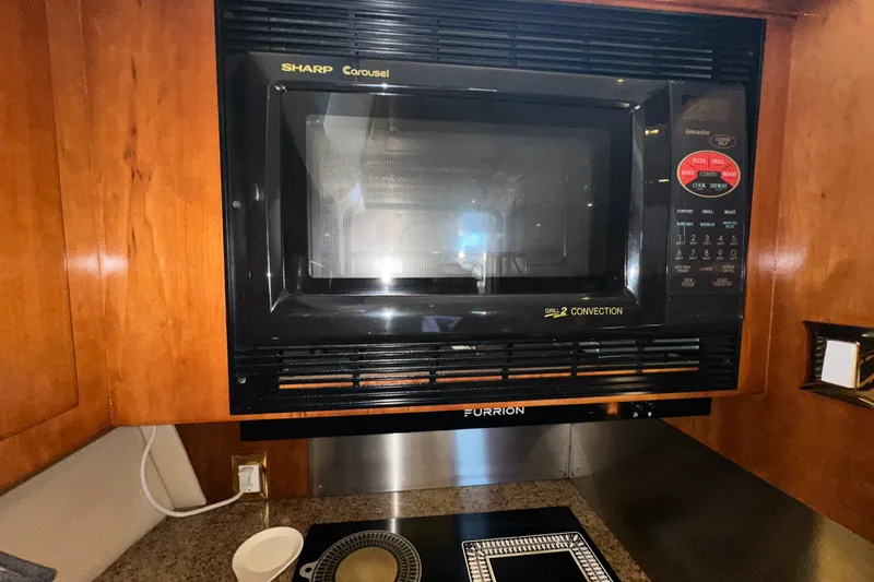 Slide: The Image of Sharp Carousel microwave in 2003 Carver 466 Motor Yacht kitchen. - 24