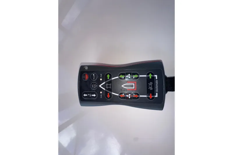 Slide: The Image of Remote control for 2003 Carver 466 Motor Yacht, featuring Dockmate system. - 64