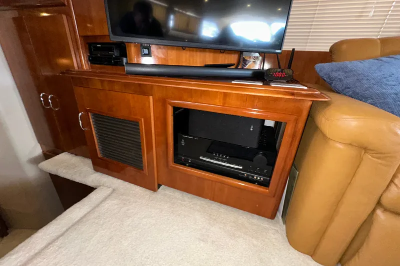 Slide: The Image of Entertainment center in 2003 Carver 466 Motor Yacht with TV and audio equipment. - 34