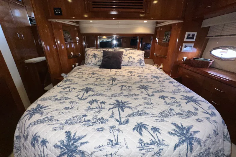 Slide: The Image of Luxurious bedroom interior of 2003 Carver 466 Motor Yacht with palm-themed bedding. - 47