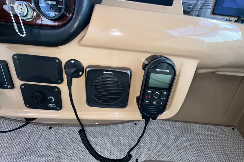 Slide: The Image of Control panel of a 2003 Carver 466 Motor Yacht with Raymarine equipment. - 61