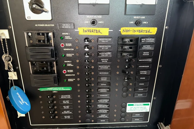 Slide: The Image of Electrical panel of a 2003 Carver 466 Motor Yacht with inverter and non-inverter sections. - 39