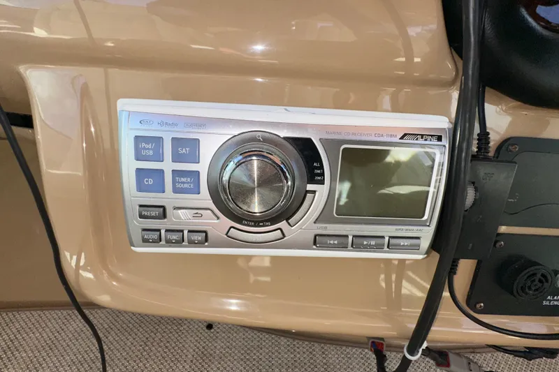 Slide: The Image of Alpine marine CD receiver in 2003 Carver 466 Motor Yacht dashboard. - 65