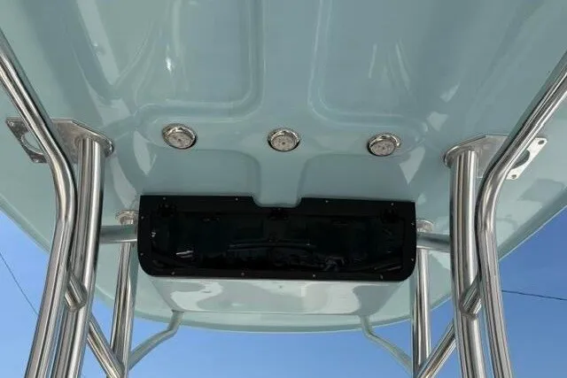 Slide: The Image of T-top view of 2025 Pioneer 220 Bay Sport boat with stainless steel supports. - 34