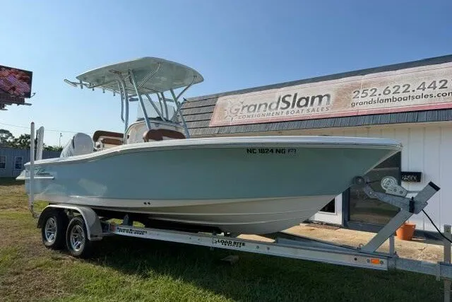 Slide: The Image of 2025 Pioneer 220 Bay Sport boat on trailer at Grand Slam Boat Sales. - 2