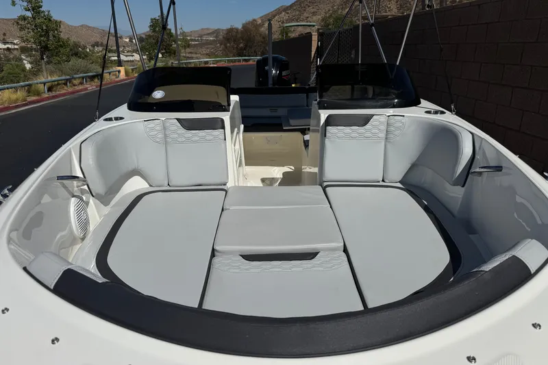 Slide: The Image of 2023 Bayliner Element M17 boat interior with spacious seating and modern design. - 10
