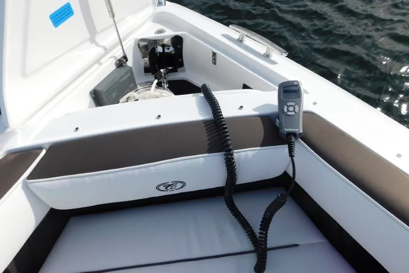 Slide: The Image of 2019 Cobalt A36BR boat interior with control panel and seating. - 30