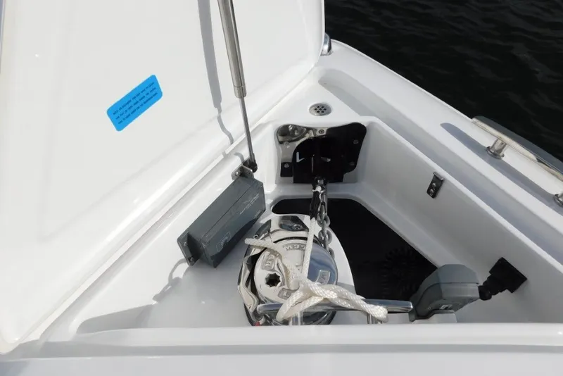 Slide: The Image of Anchor compartment of 2019 Cobalt A36BR boat with chain and rope. - 29