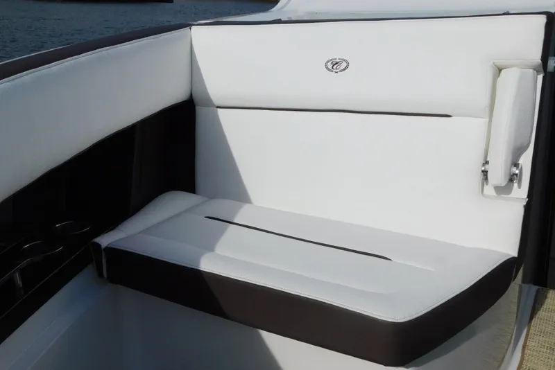 Slide: The Image of 2019 Cobalt A36BR boat interior with white cushioned seating and elegant design. - 28
