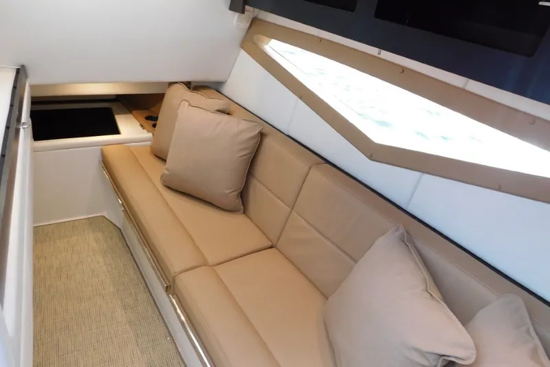 Slide: The Image of Luxurious interior of 2019 Cobalt A36BR boat with beige seating and modern design. - 24