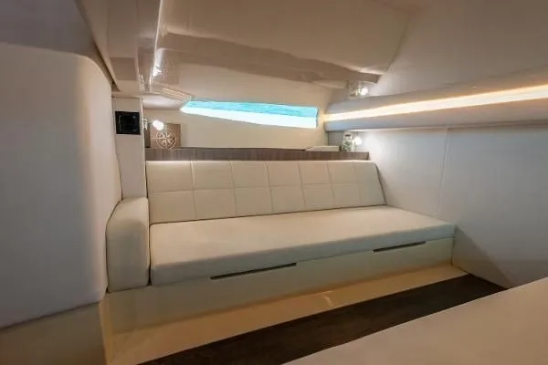 Slide: The Image of Luxurious interior of 2021 Regal 38 SAV yacht with elegant white seating. - 24