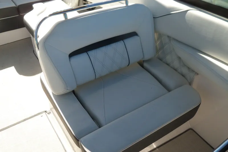 Slide: The Image of Luxurious seating in a 2020 Regal LS6 boat, featuring elegant upholstery and modern design. - 22