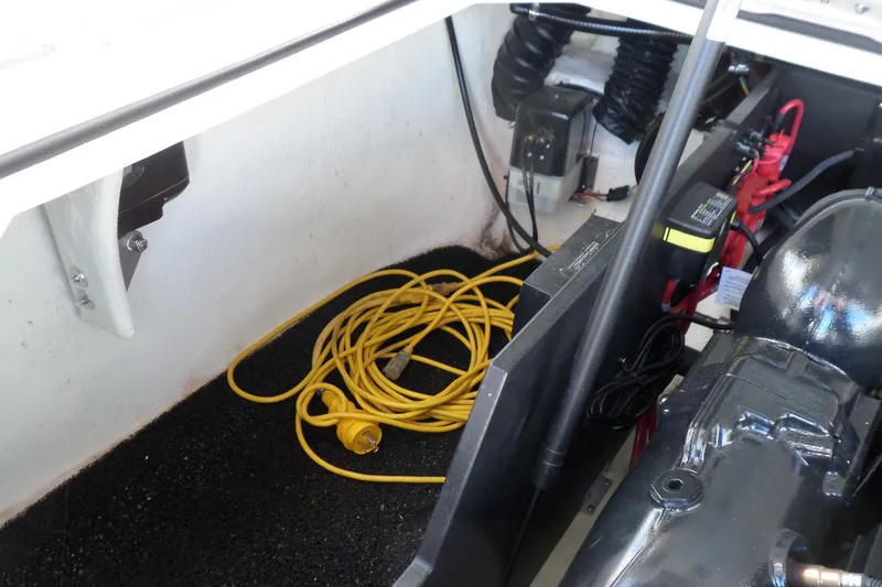Slide: The Image of 2020 Regal LS6 engine compartment with yellow power cable and mechanical components. - 30