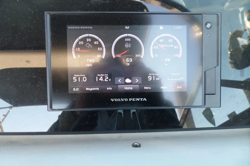 Slide: The Image of Volvo Penta display on 2020 Regal LS6 showing engine metrics and performance data. - 42