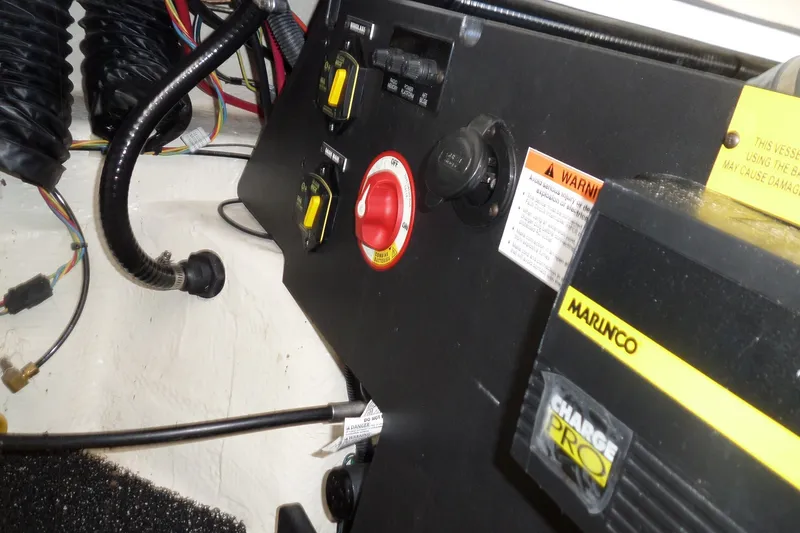 Slide: The Image of Control panel of a 2020 Regal LS6 boat with wiring and switches. - 31