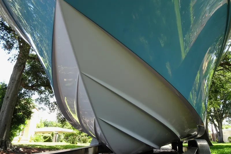 Slide: The Image of 2021 Sea Fox 248 Commander boat hull, close-up view, showcasing sleek design and craftsmanship. - 7