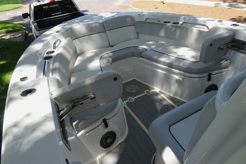 Slide: The Image of 2021 Sea Fox 248 Commander boat interior with cushioned seating and modern design. - 16