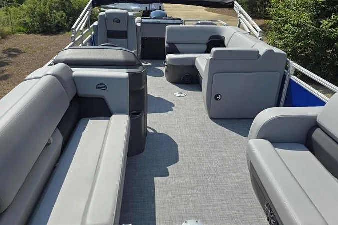 Slide: The Image of 2027 Sun Tracker SportFish 22 DLX pontoon boat with spacious seating and modern design. - 13