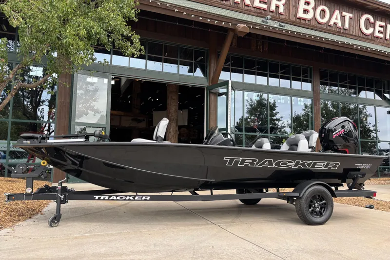 The Image of 2027 Tracker Pro Team 190 boat displayed at a boat center. - 0