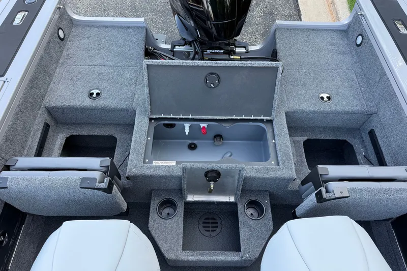 Slide: The Image of Interior view of 2027 Tracker Targa V-18 Combo boat, showcasing seating and storage compartments. - 17