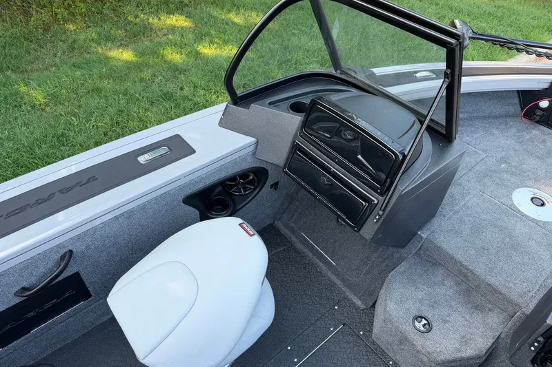 Slide: The Image of Interior of 2027 Tracker Targa V-18 Combo boat with seating and dashboard. - 13
