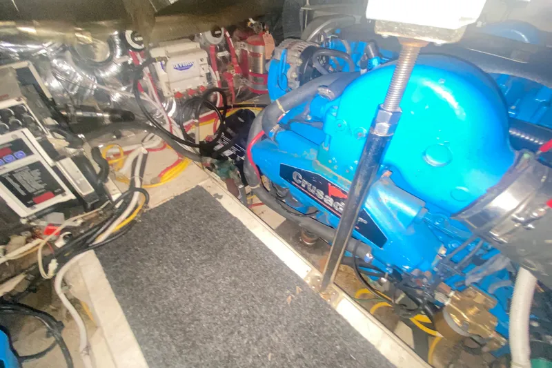 Slide: The Image of Engine room of 2006 Carver 41 Cockpit Motor Yacht with Crusader engine components. - 23