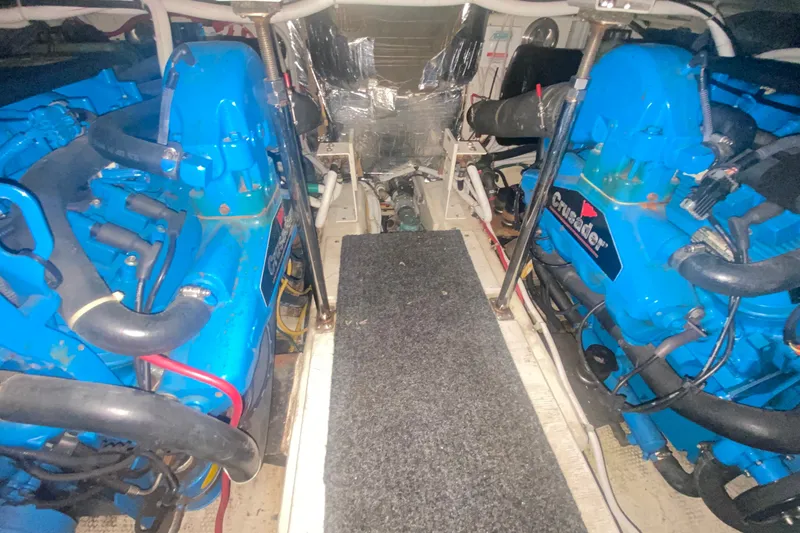 Slide: The Image of Engine room of 2006 Carver 41 Cockpit Motor Yacht with blue Crusader engines. - 20
