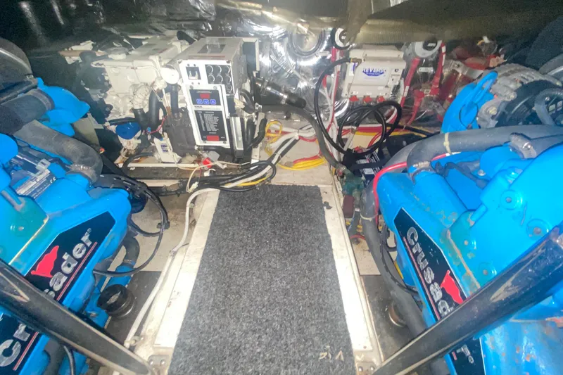 Slide: The Image of Engine room of a 2006 Carver 41 Cockpit Motor Yacht with Crusader engines. - 19