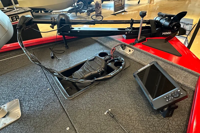 Slide: The Image of 2027 Tracker Pro Team 195 boat deck with Minn Kota trolling motor and Lowrance fish finder. - 41