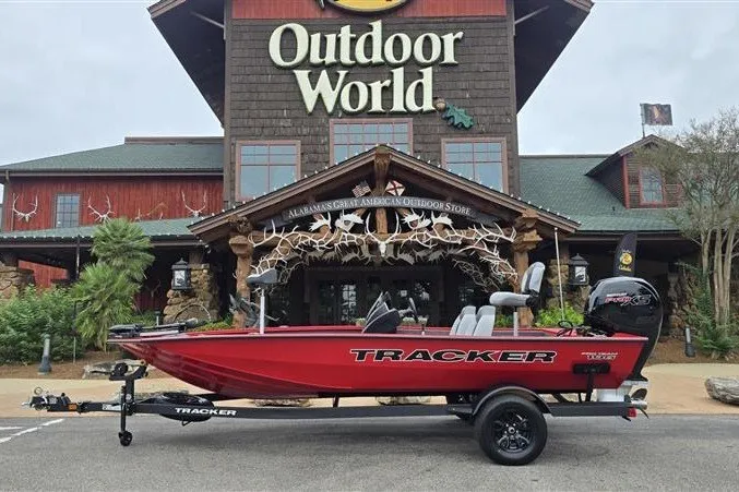 The Image of 2027 Tracker Pro Team 195 boat displayed outside Outdoor World store. - 0