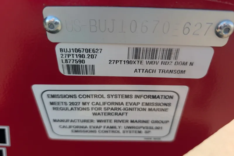 Slide: The Image of Emissions control label on 2027 Tracker Pro Team 190 boat, detailing compliance and specifications. - 15