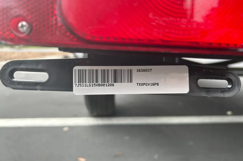 Slide: The Image of Barcode and serial number on 2027 Tracker Pro Guide V-16 WT trailer. - 67