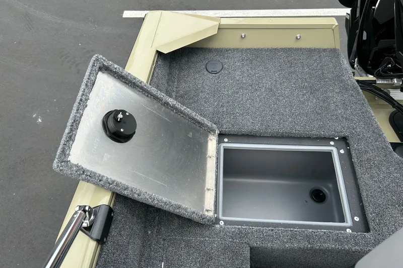 Slide: The Image of 2027 Tracker Pro Guide V-16 WT boat with open storage compartment. - 33
