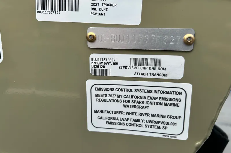 Slide: The Image of 2027 Tracker Pro Guide V-16 WT emissions label and identification plate on boat transom. - 64