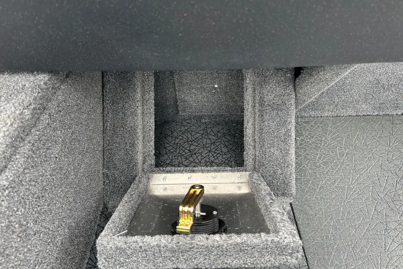 Slide: The Image of Interior compartment of 2027 Tracker Pro Guide V-16 WT boat, featuring textured surfaces. - 29