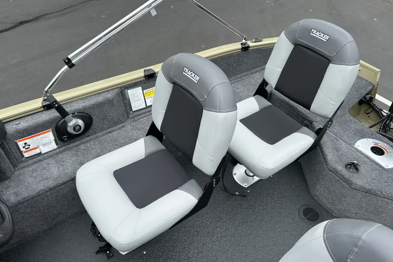 Slide: The Image of 2027 Tracker Pro Guide V-16 WT boat interior with two cushioned seats. - 17