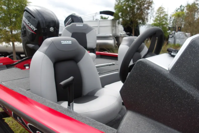 Slide: The Image of 2027 Tracker Pro Team 190 boat interior with steering wheel and seating. - 15