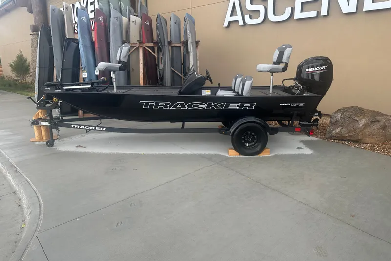 The Image of 2027 Tracker Pro 170 boat on display with Mercury engine, outdoor setting. - 0
