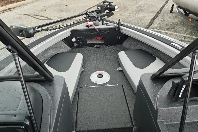 Slide: The Image of 2027 Tracker Targa V-18 Combo boat interior with seating and fishing equipment. - 36