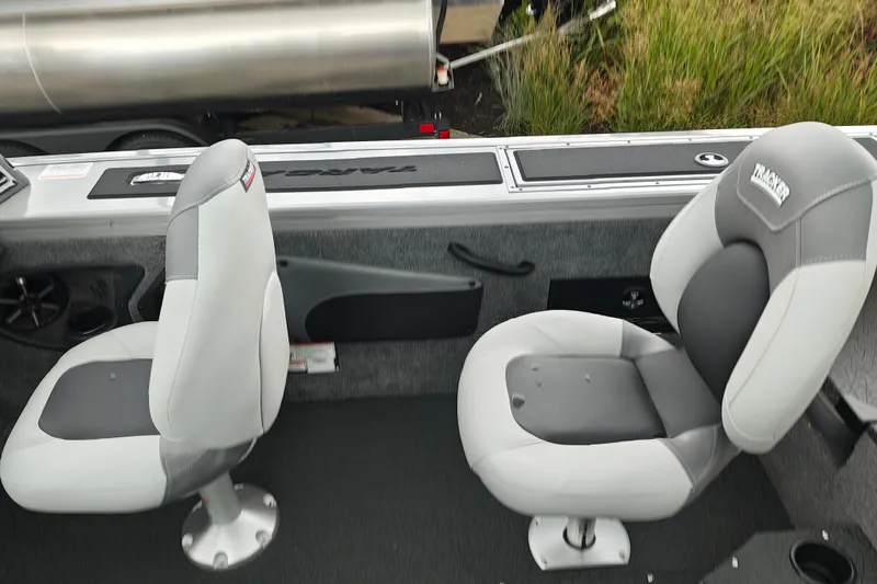 Slide: The Image of 2027 Tracker Targa V-18 Combo boat interior with two gray seats. - 15