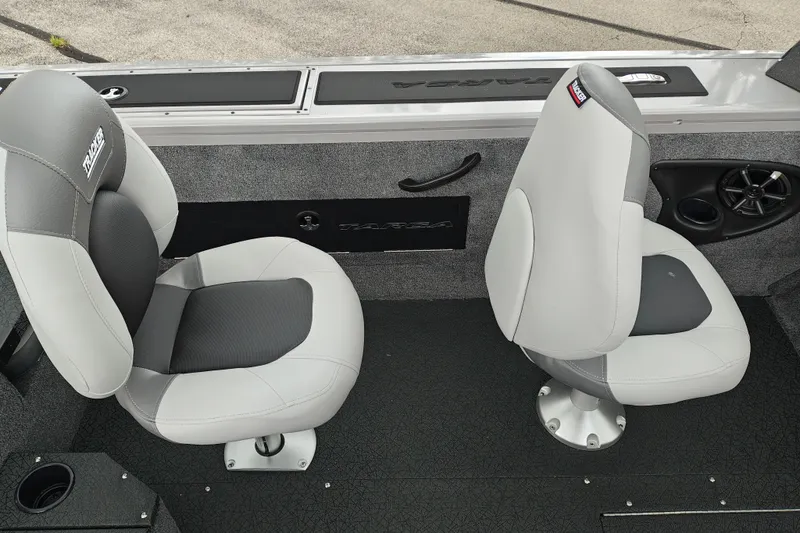 Slide: The Image of 2027 Tracker Targa V-18 Combo boat interior with two gray cushioned seats. - 14