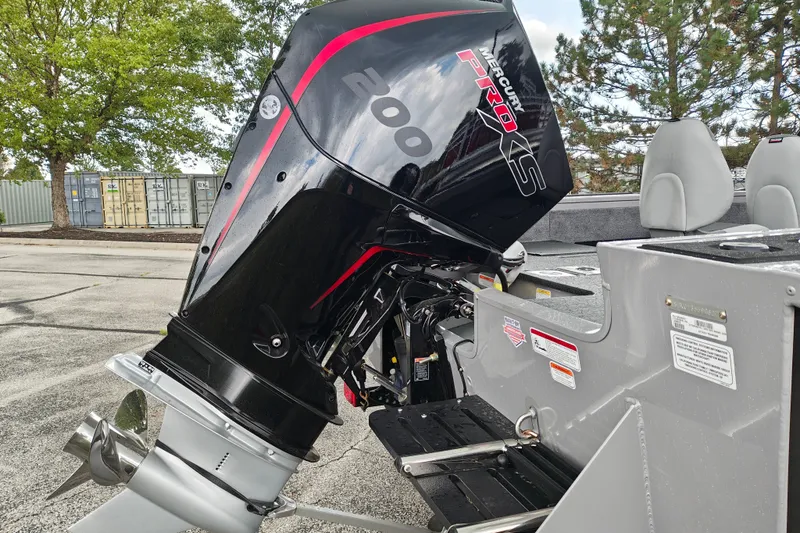 Slide: The Image of 2027 Tracker Targa V-18 Combo boat with Mercury Pro XS 200 engine, parked outdoors. - 41